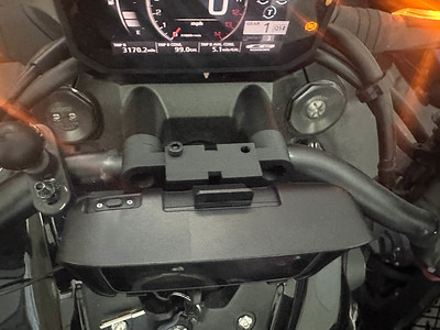 A front/top view, showing the bolts attaching through the front