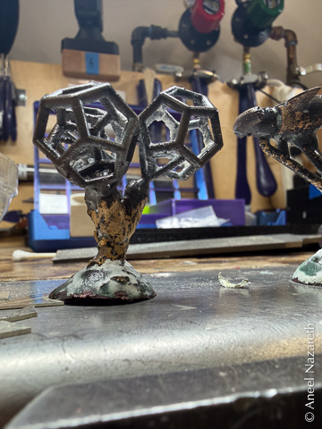 Dodecahedra cast in bronze